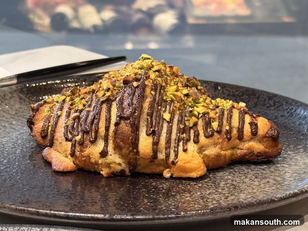 Pistachio Croissant with Chocolate Drizzle