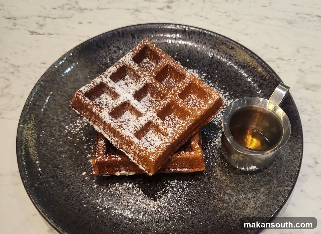 Waffles with Powdered Sugar and Syrup