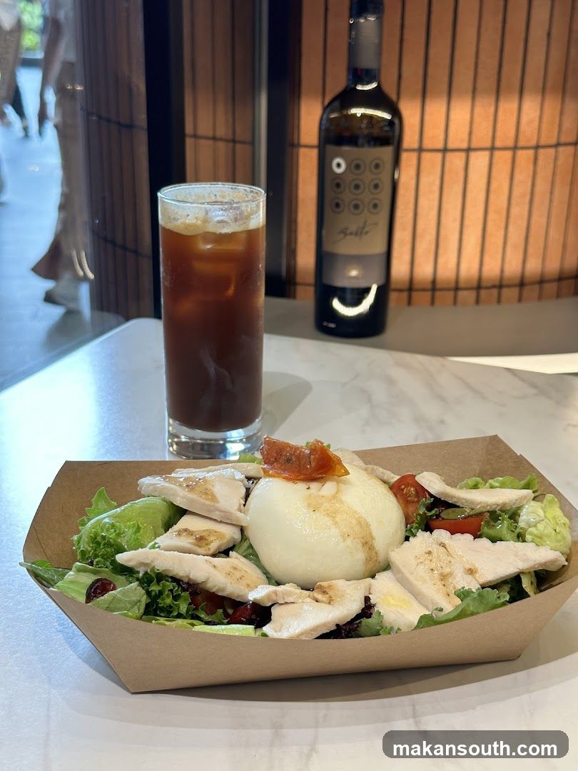 Salad with Iced Coffee and Wine Bottle
