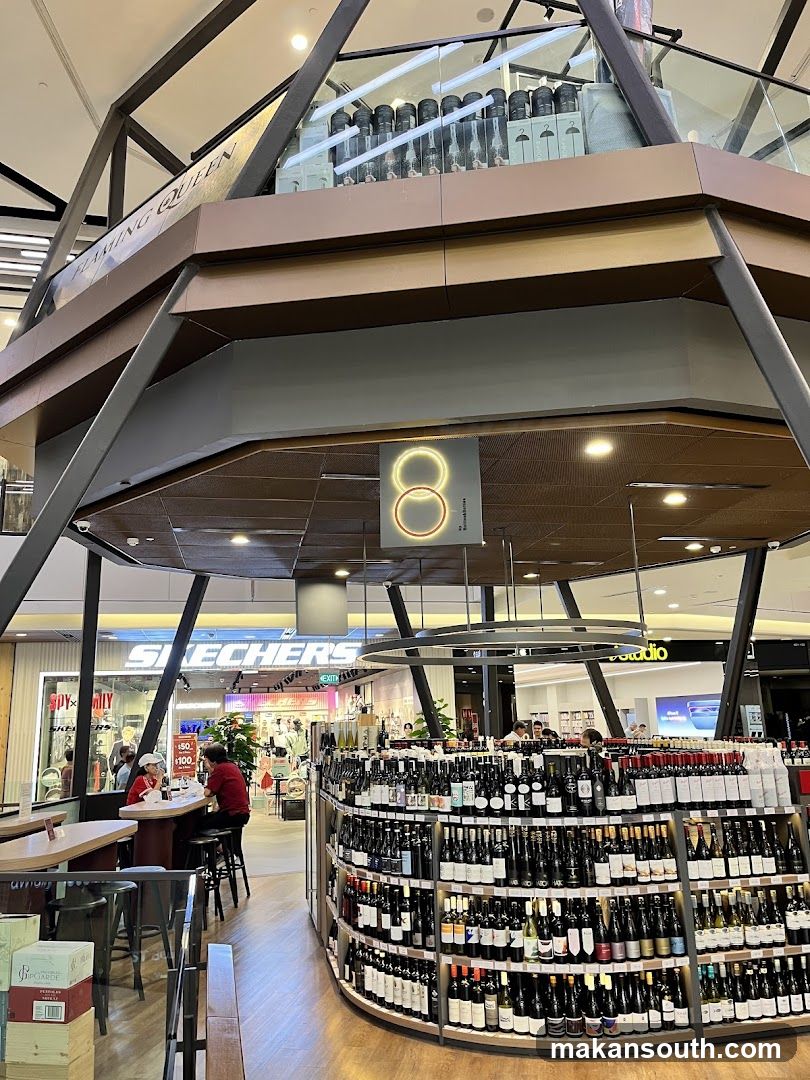 Wine Shop Interior with Skechers Store in Background