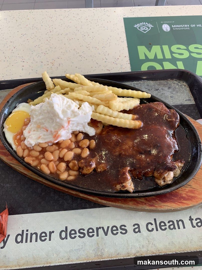 Served Meal with Steak, Fries and Beans