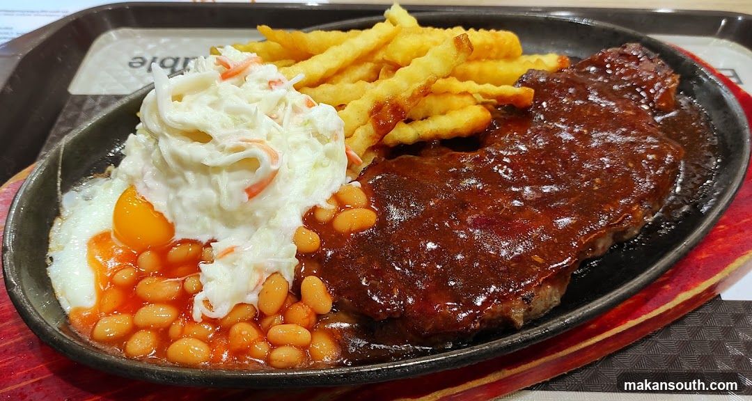 Sizzling Steak Plate with Fries and Coleslaw