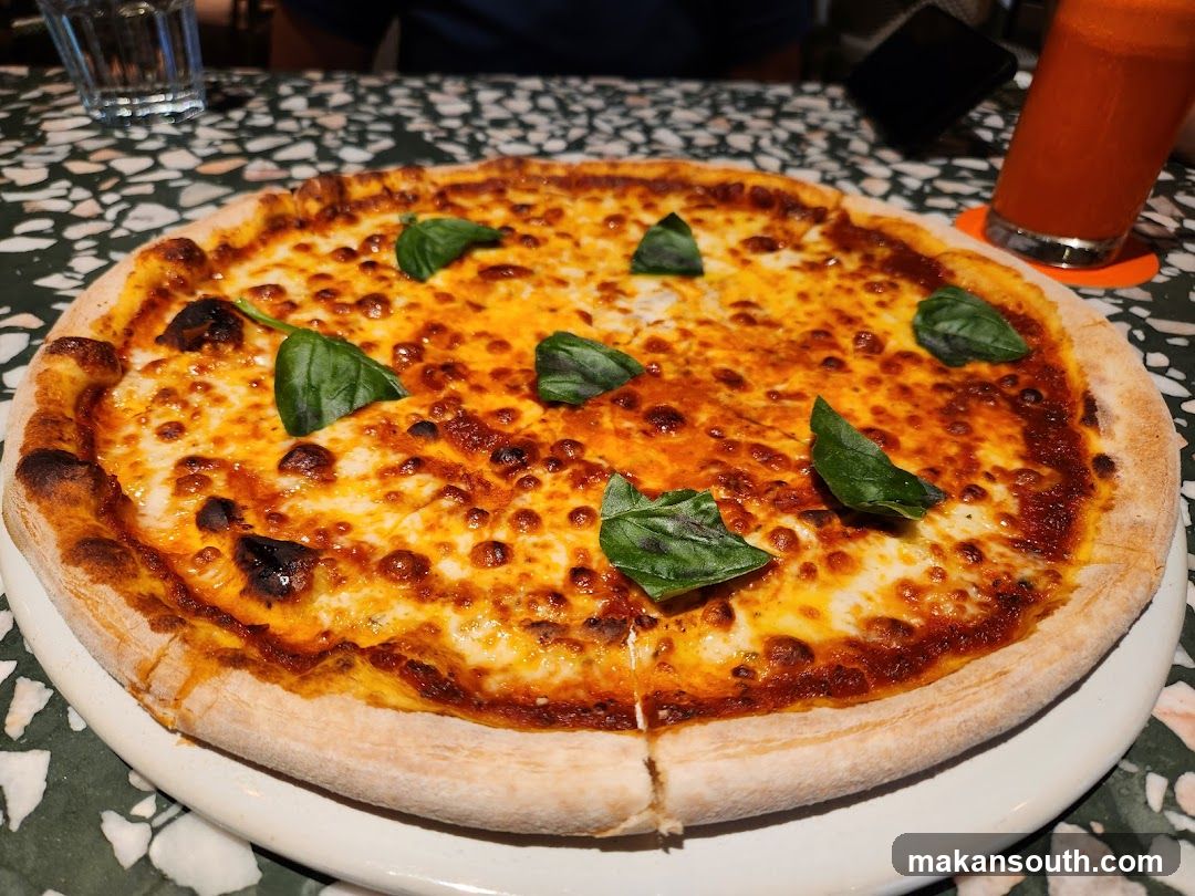 Pizza with Basil Leaves