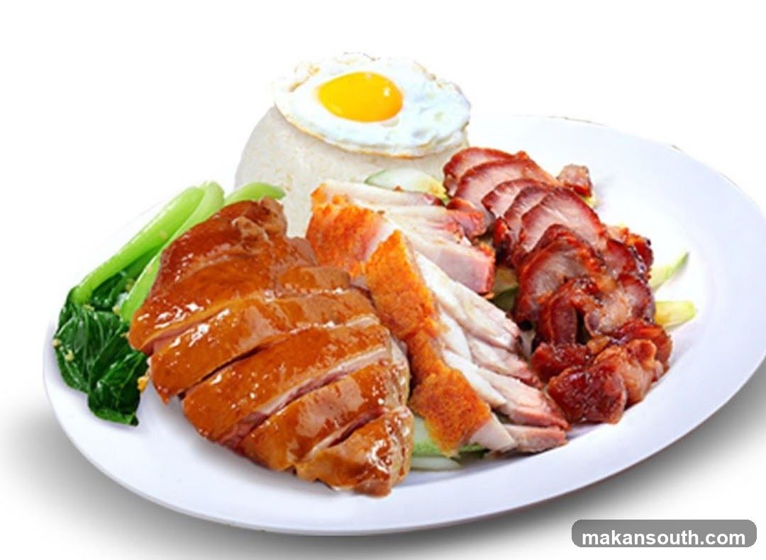 Roast Chicken and Pork Plate with Fried Egg