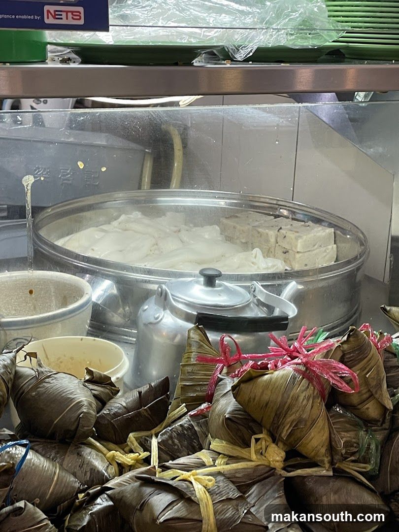 Food Display with Steamed Dishes and Zongzi