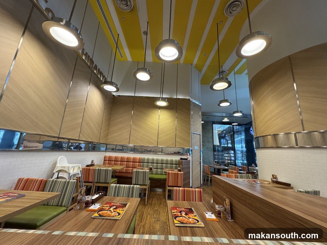 Restaurant Interior with Booth Seating and Pendant Lighting