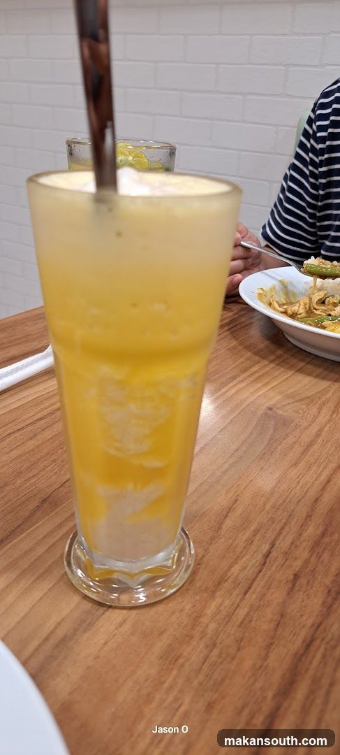 Yellow Drink and Meal at Restaurant