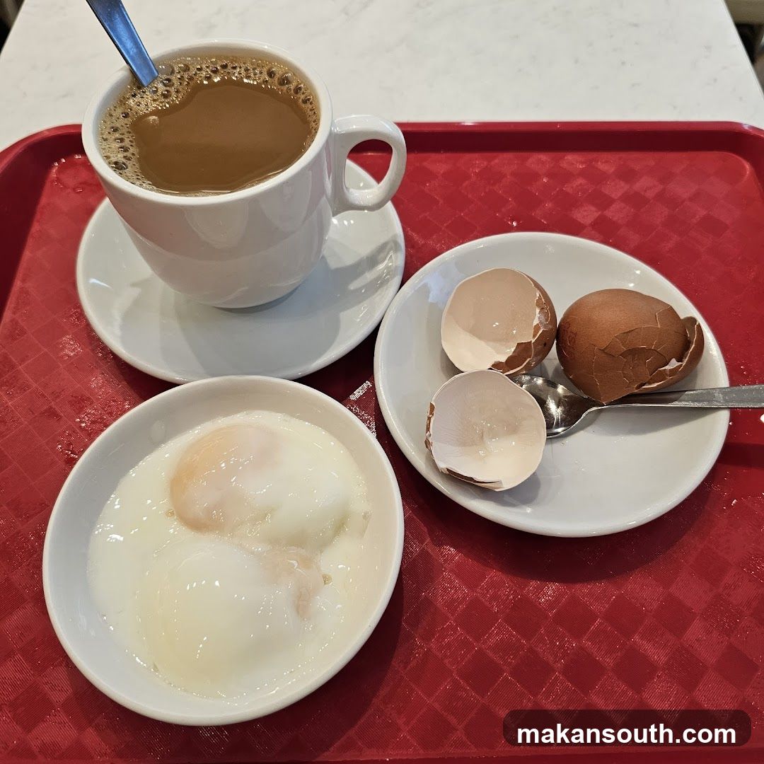Breakfast Tray with Poached Eggs and Coffee