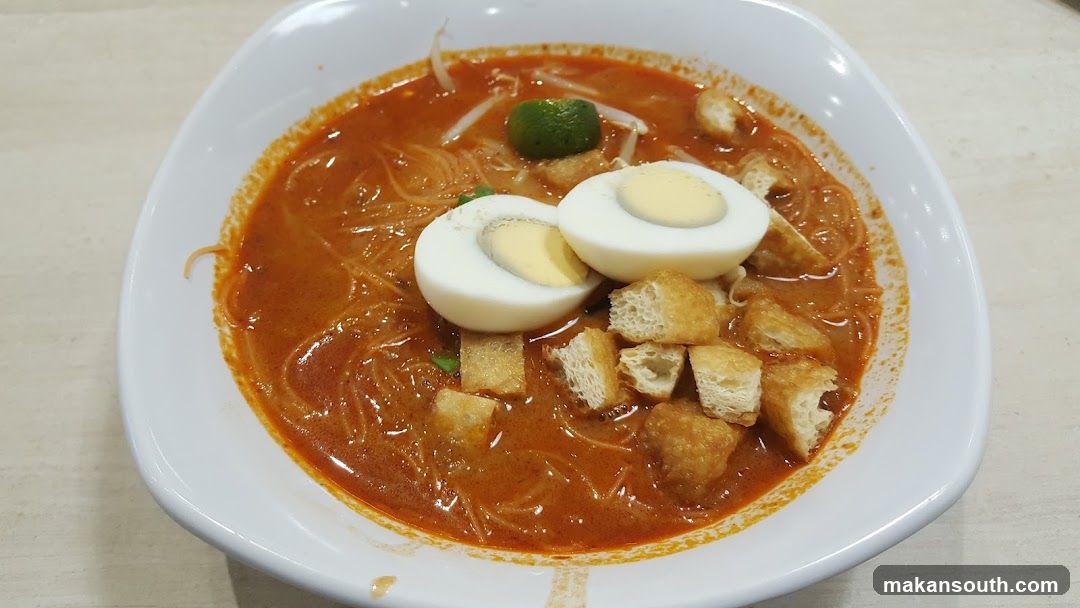 Spicy Noodle Soup with Boiled Egg and Fried Dough