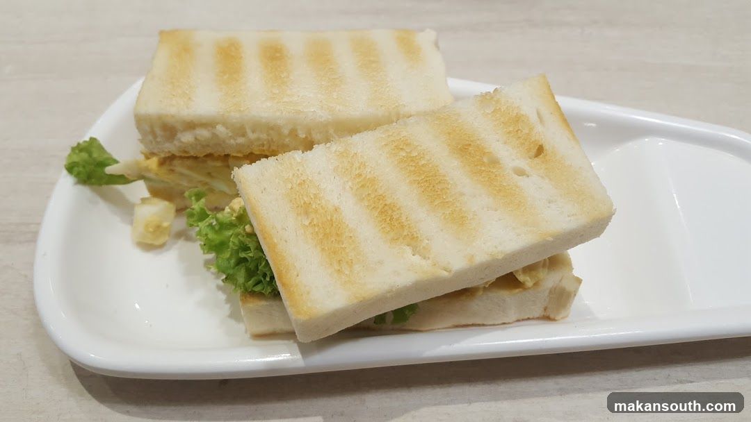 Grilled Sandwich on White Plate