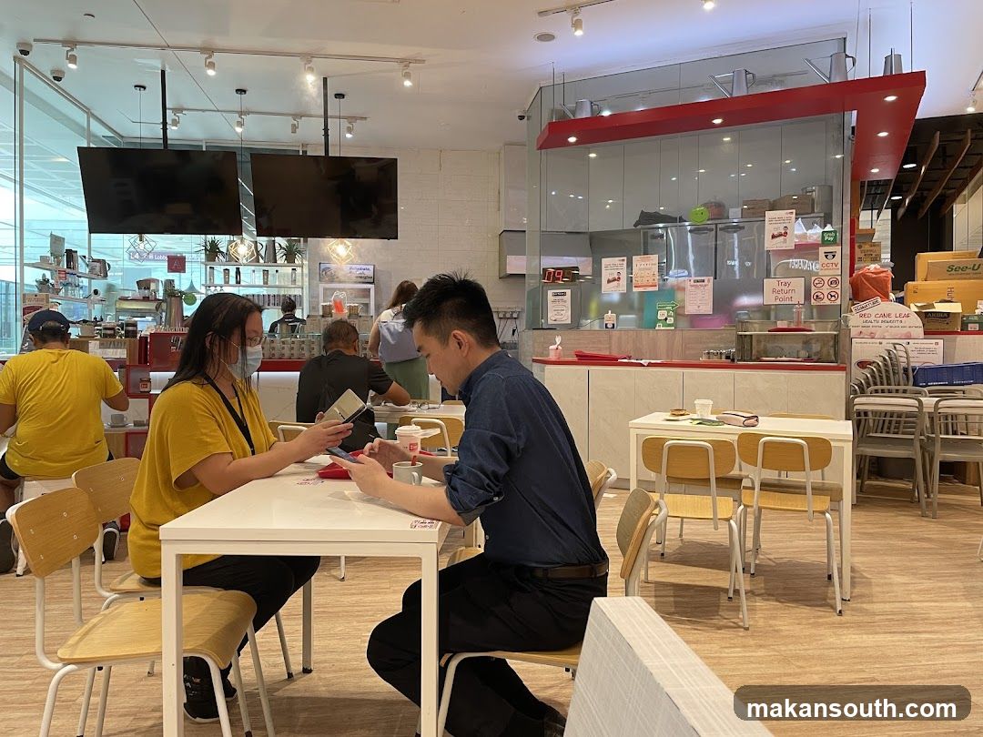 Dining Area with Staff and Customers