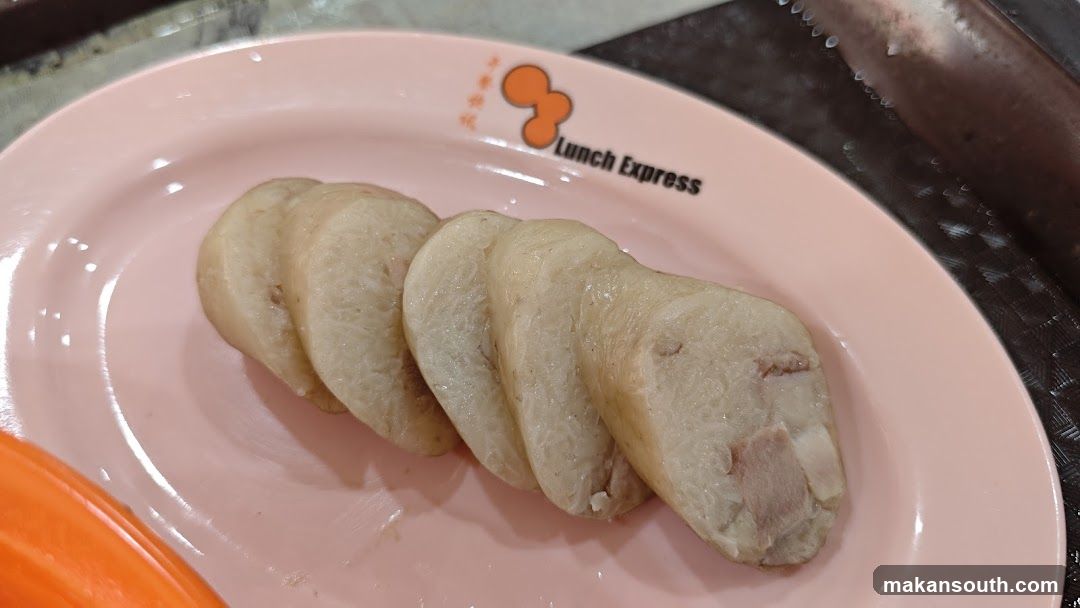 Sliced Meat on Pink Plate
