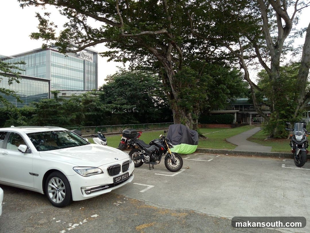 Parking Lot with Vehicles and Buildings