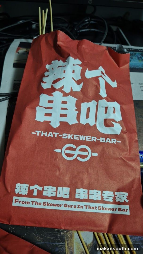 Red bag with Chinese text and English text