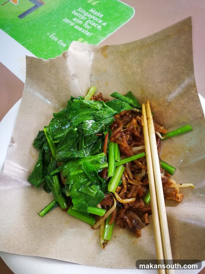 Stir-fried vegetables and noodles on paper wrapper