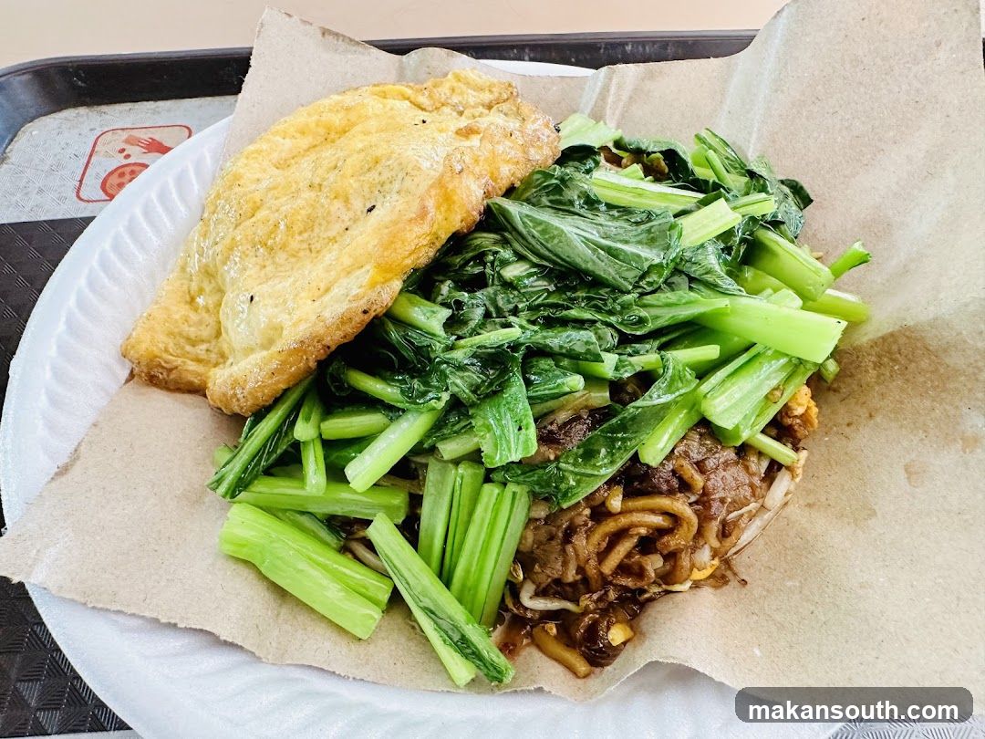 Noodle Dish with Egg and Greens