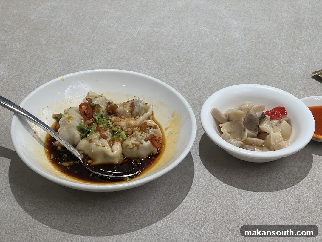 Dumplings with Sauce and Side Dish