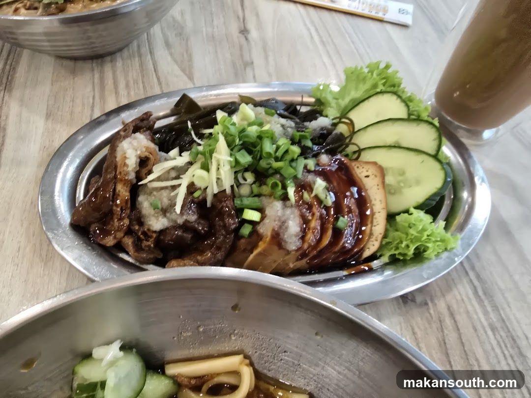 Food Dish with Sliced Meat and Vegetables