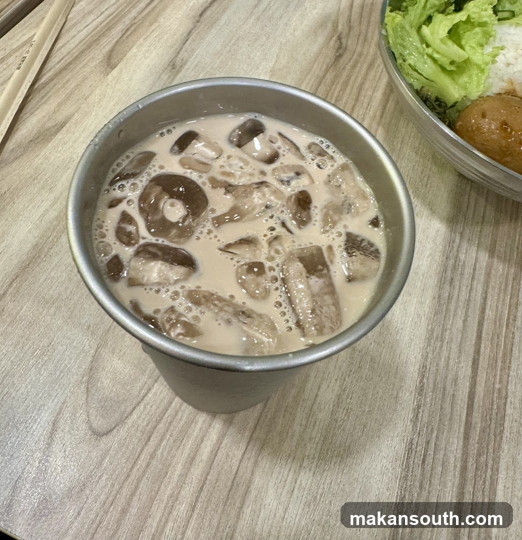 Bowl of mushroom soup with rice and side dish