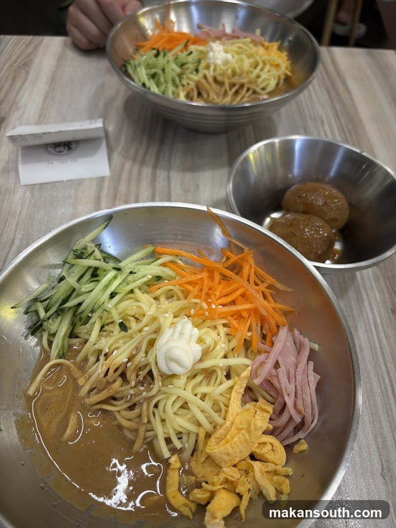 Bowl of noodles with toppings