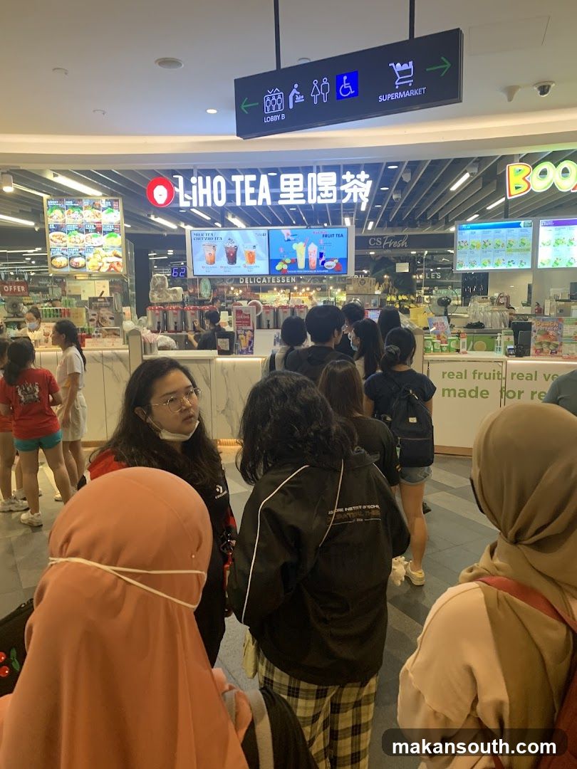 Crowded Mall Interior with LiHo Tea Counter
