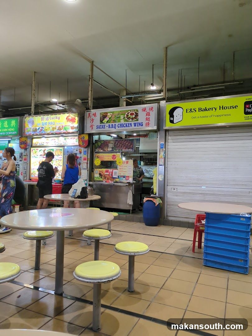 Food Court Interior with Shops and Tables