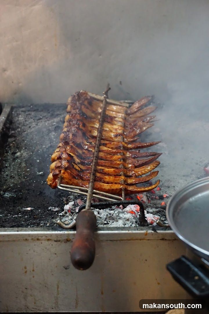 Grilled Ribs Cooking Over Charcoal