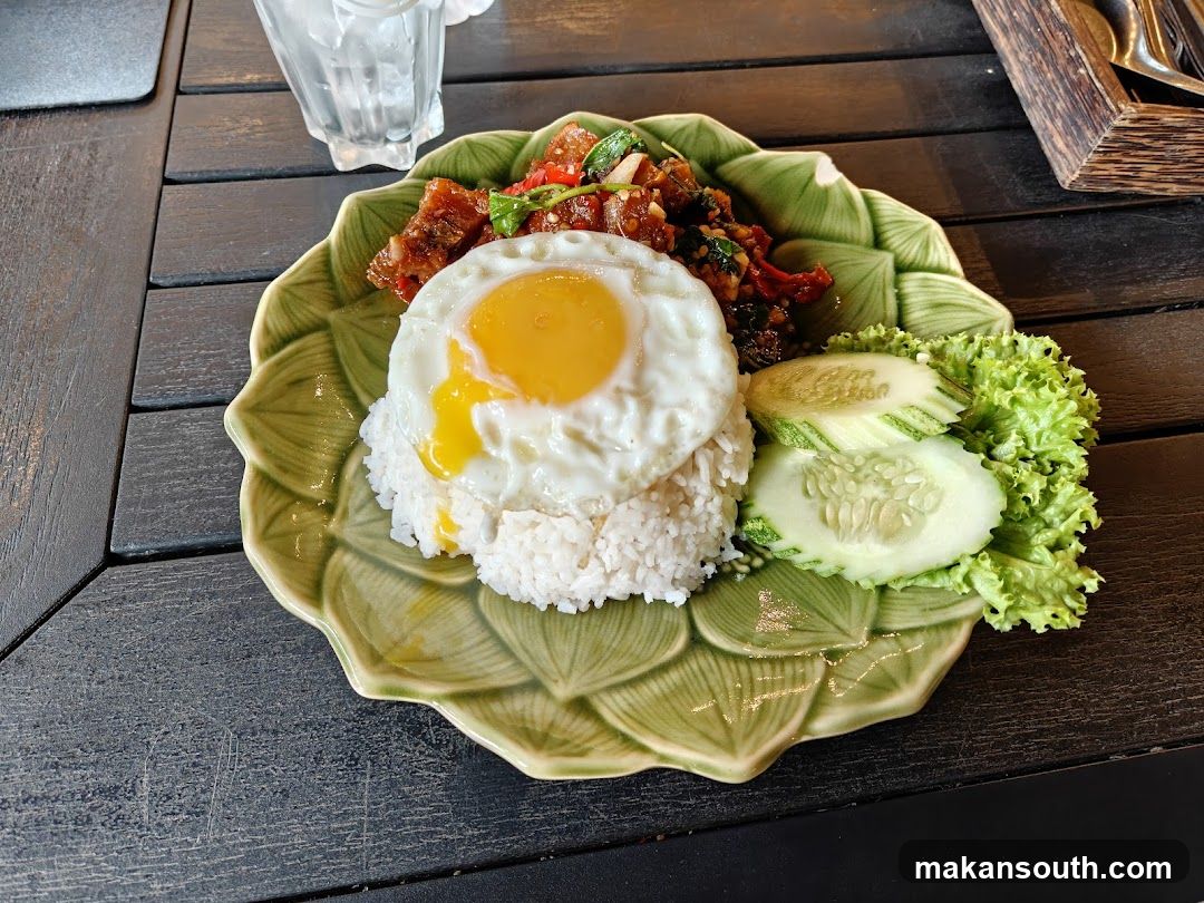 Plate of Fried Rice with Egg and Side Dishes