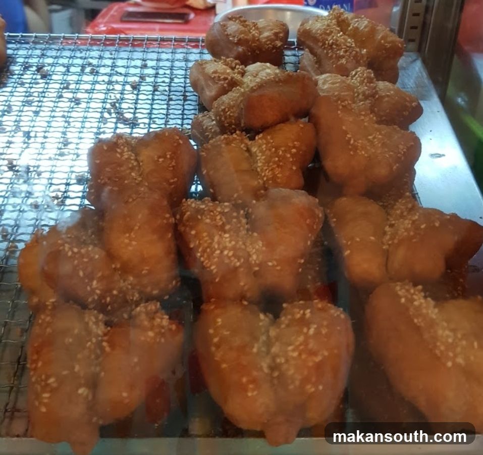 Fried Dough Pastries with Sesame Seeds