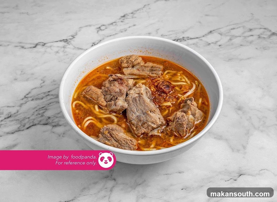 Bowl of Spicy Noodle Soup with Meat
