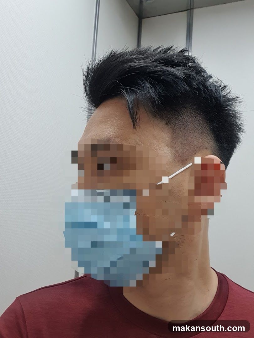 Person wearing mask and red shirt
