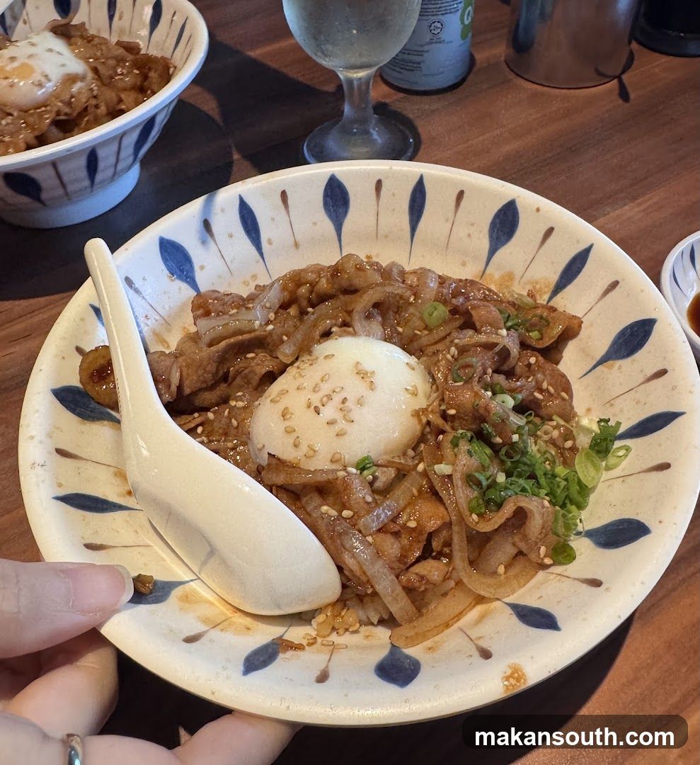 Bowl of Noodles with Egg and Onions