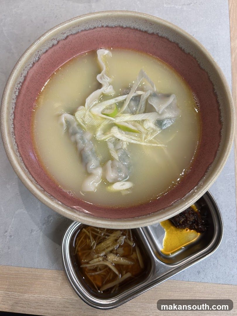 Bowl of Soup with Side Dishes