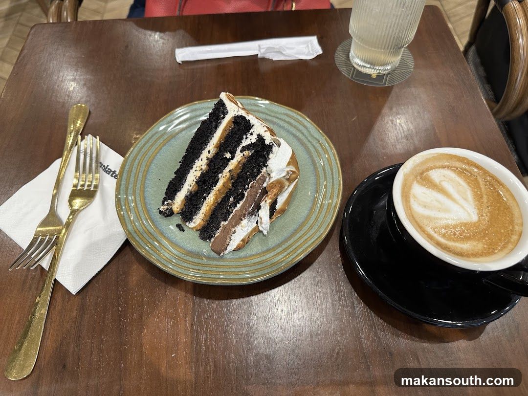 Cake and Coffee on Wooden Table