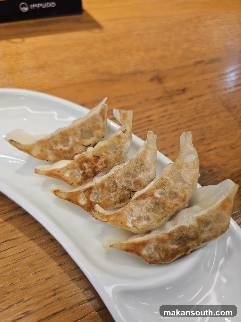 Gyoza on a white plate