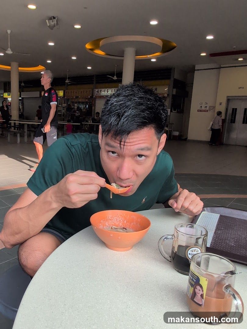 Man eating at a food court
