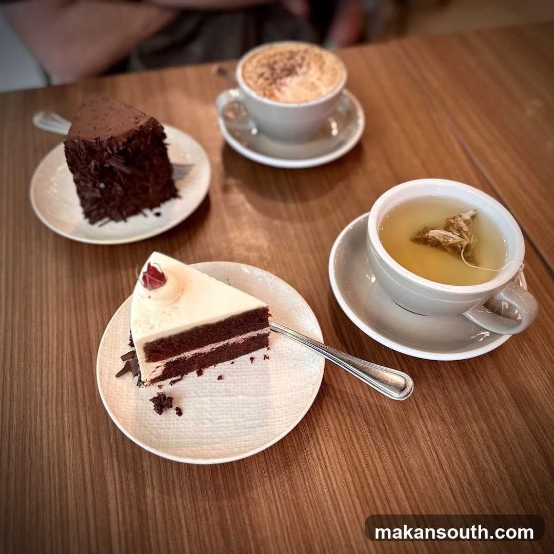 Cafe Table Setting with Desserts and Tea