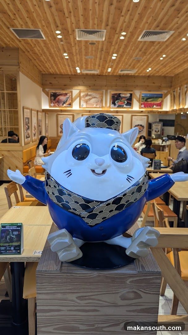 Cat Statue in Restaurant Interior