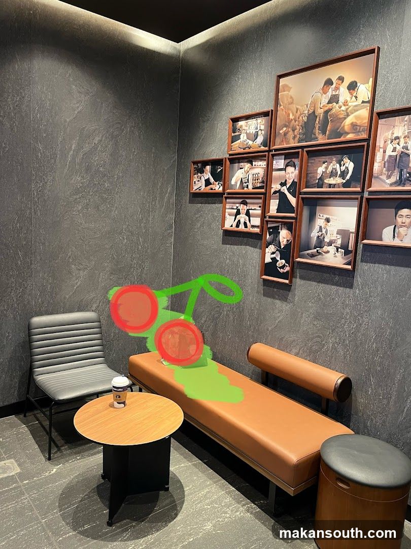 Interior seating area with framed photos