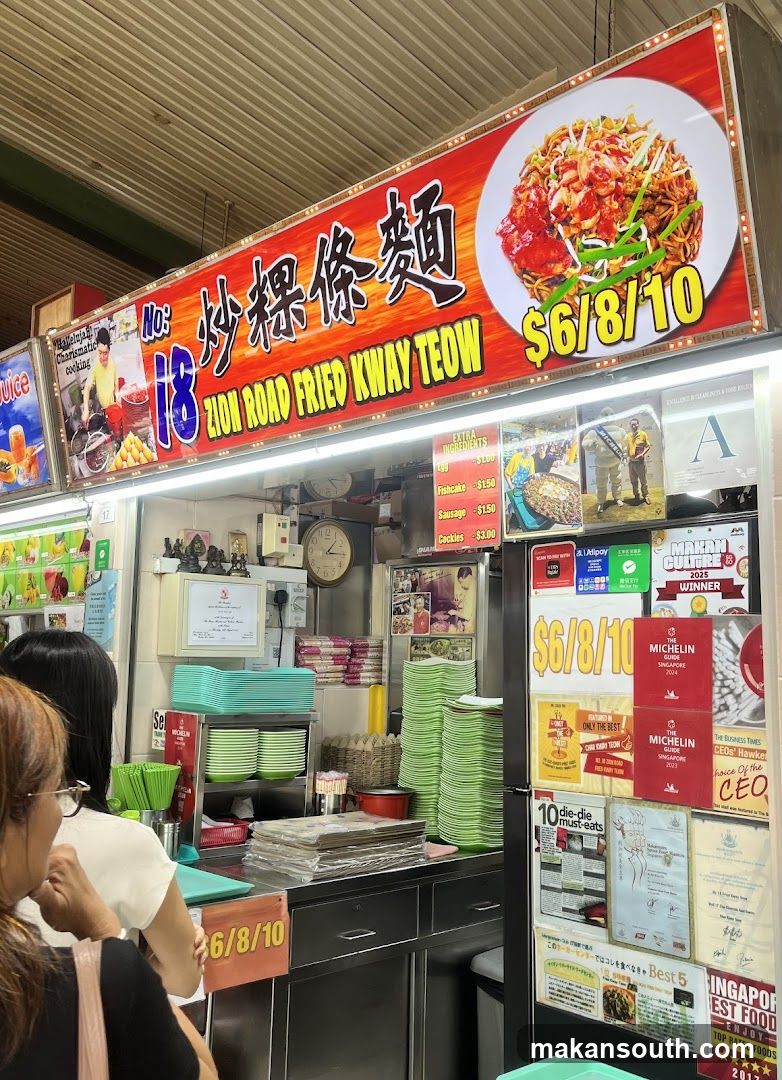 Food Stall Interior with Signage and Posters