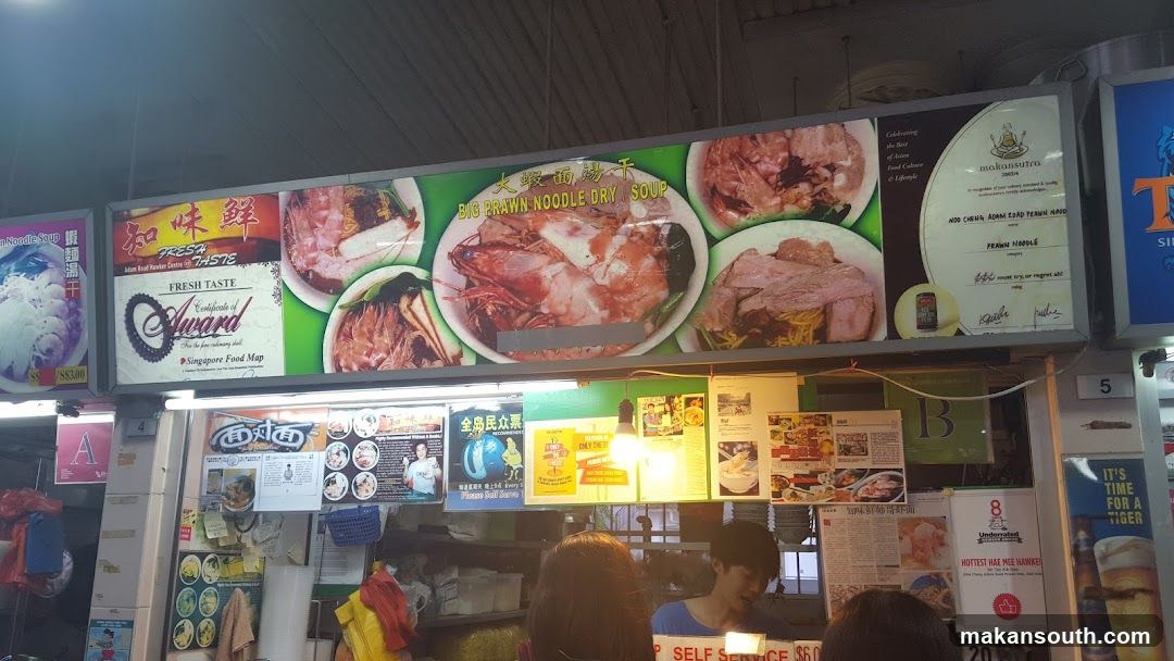 Food Stall Interior with Signage and Posters