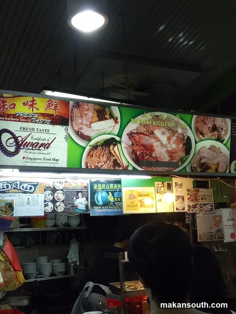 Food Stall Interior with Signage and Menu Display