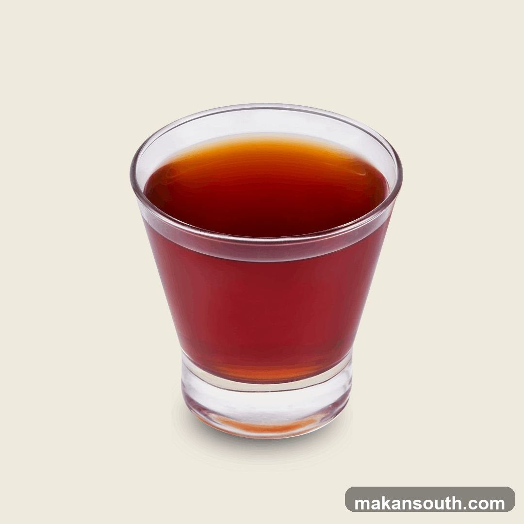 Glass of Dark Liquid