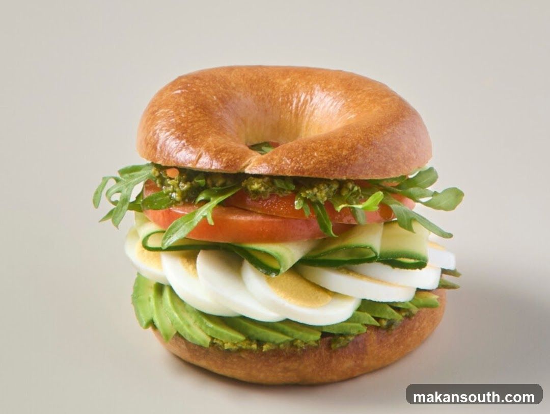 Bagel Sandwich with Avocado, Egg, and Tomato