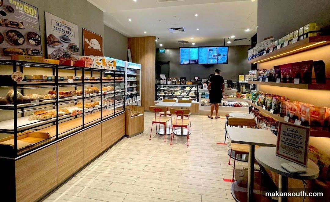Bakery Interior with Display Cases and Menu Boards