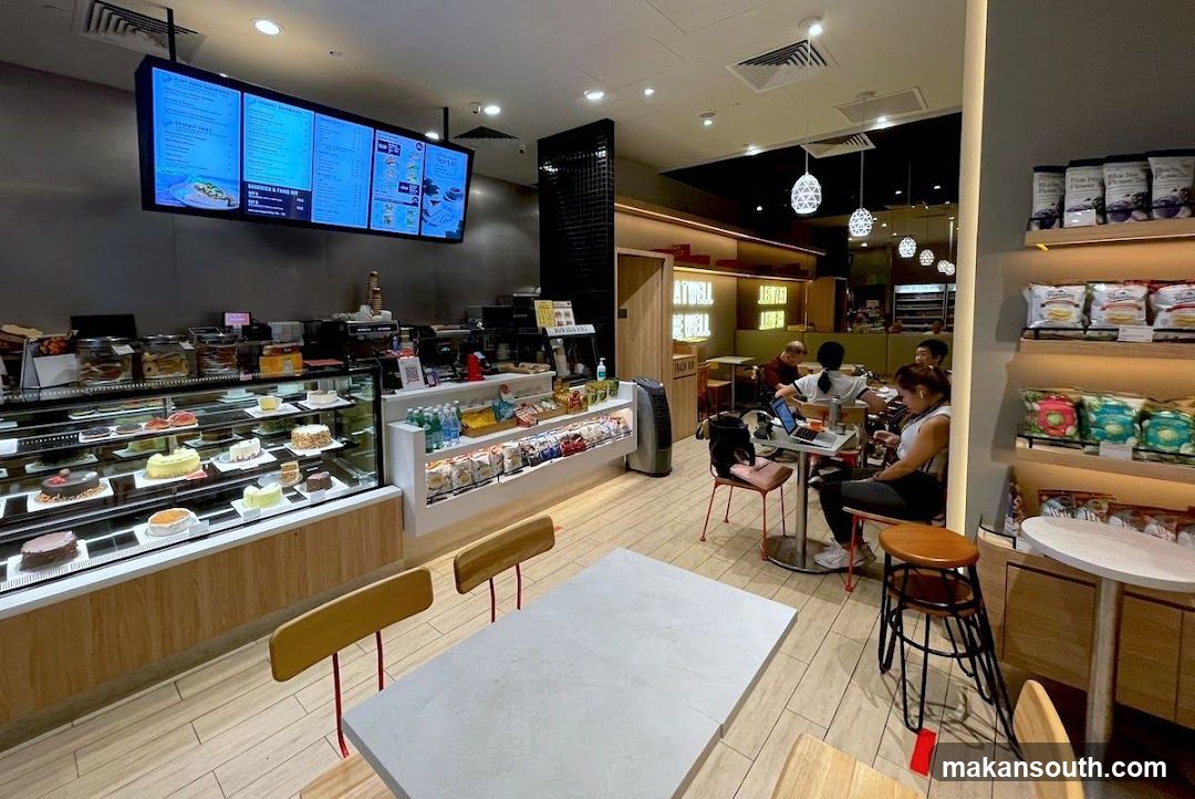Coffee Shop Interior with Menu Display and Seating Area