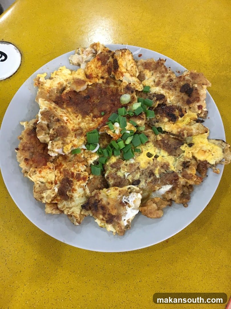 Plate of Fried Egg with Green Onions