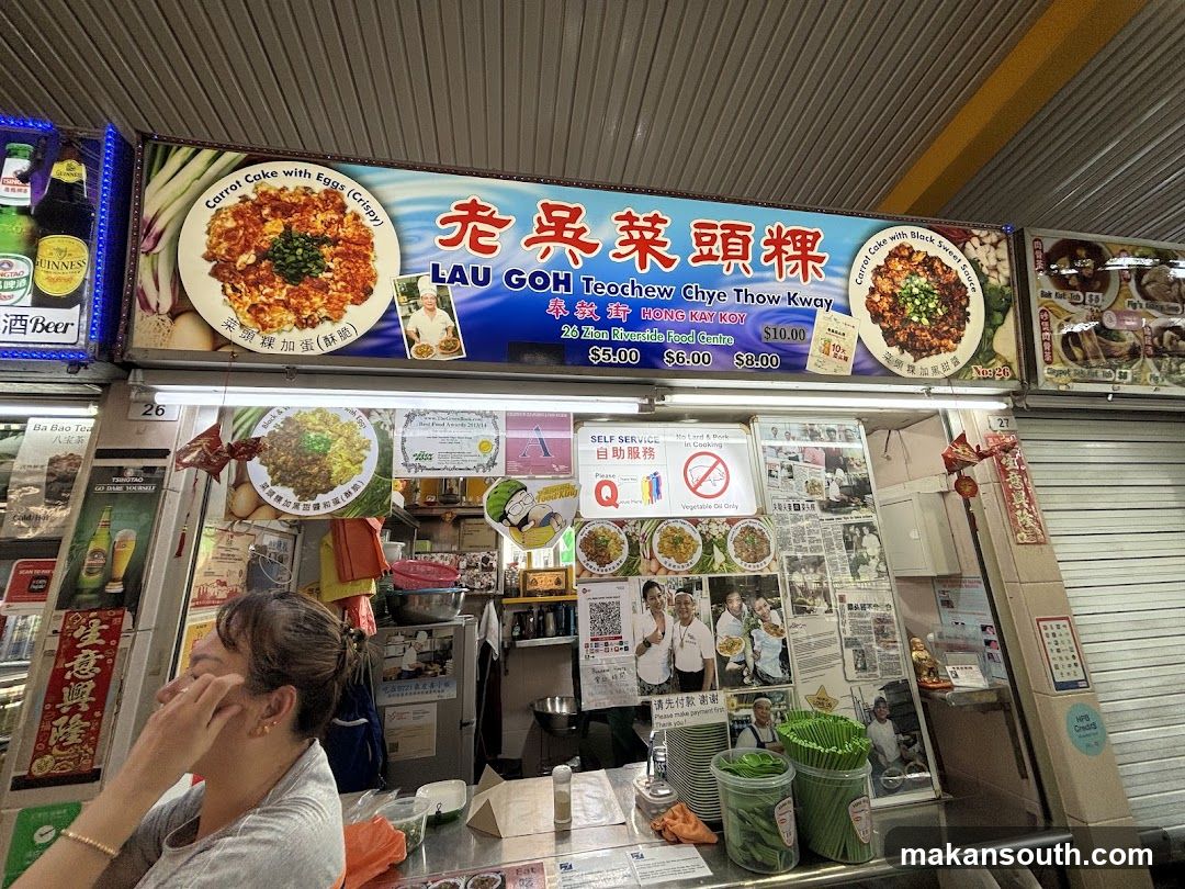 Food Stall Interior with Signage and Staff