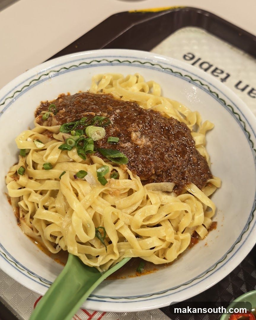 Noodle Dish with Sauce and Green Onions