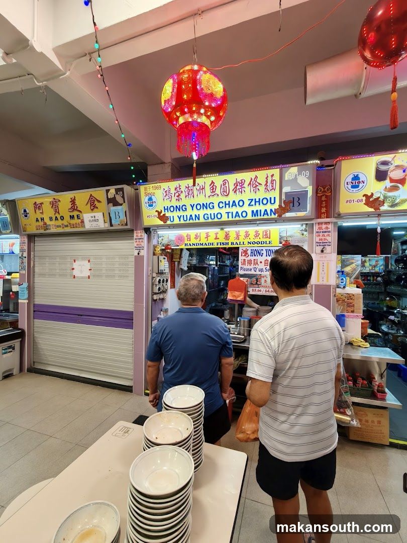 Food Stall Interior with Customers